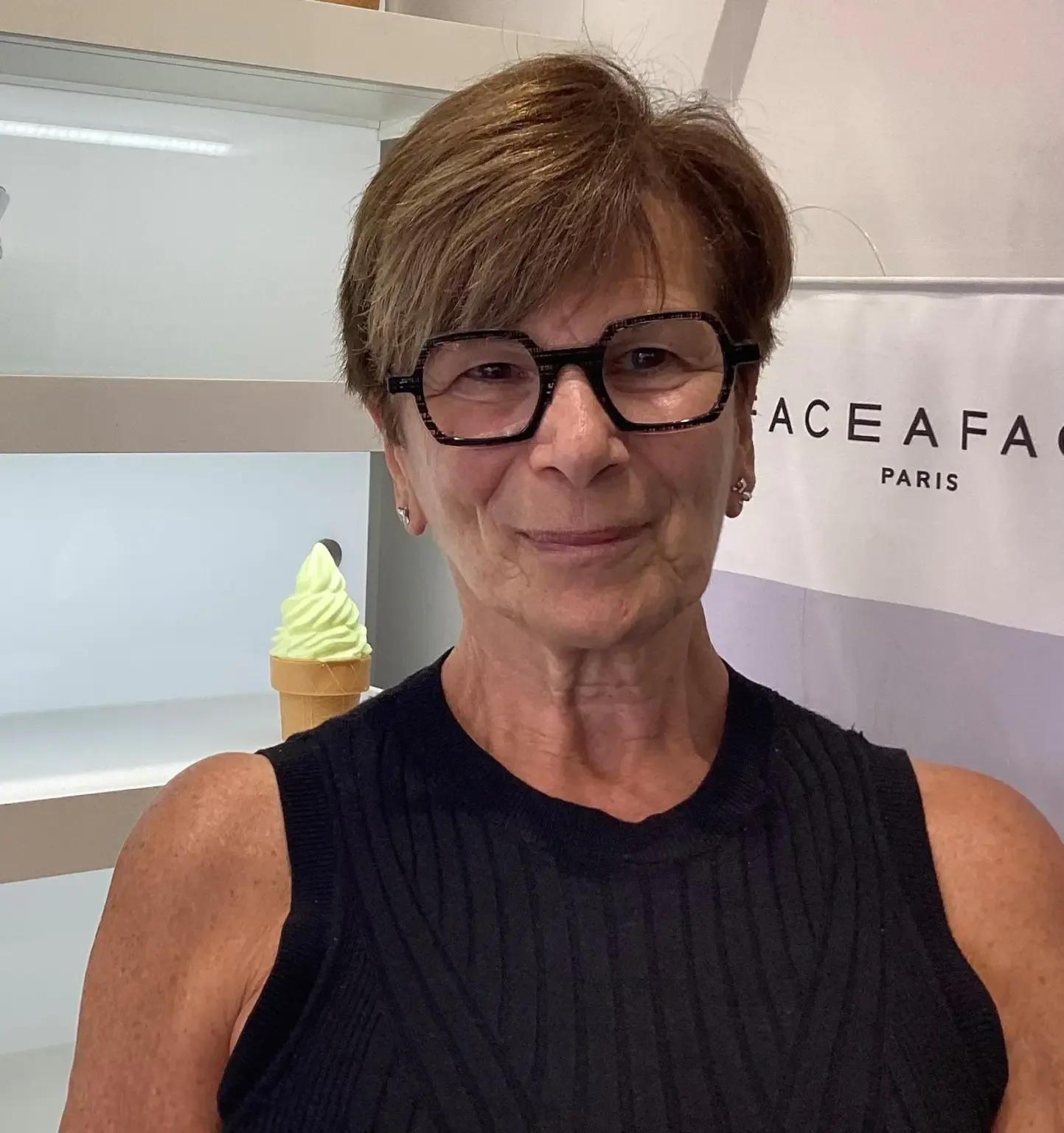 Happy Eyewise client wearing glasses, photo 10