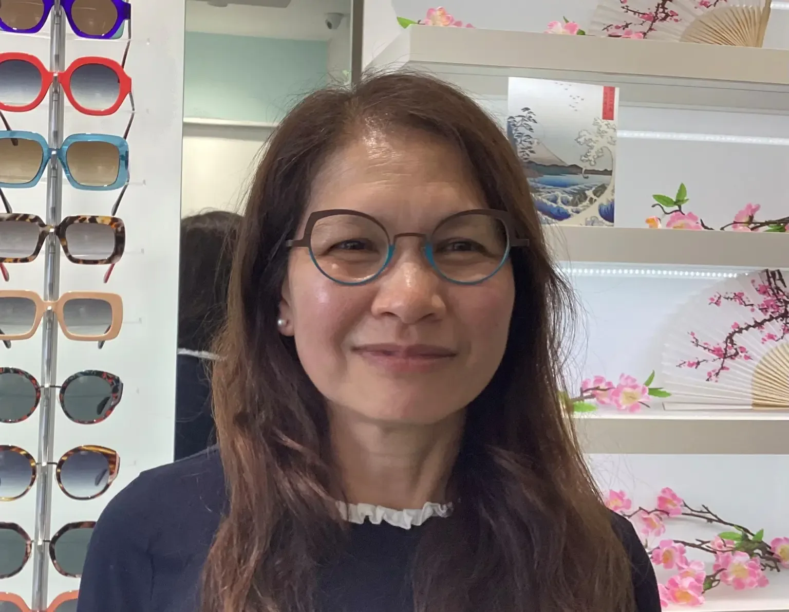 Happy Eyewise client wearing glasses, photo 6